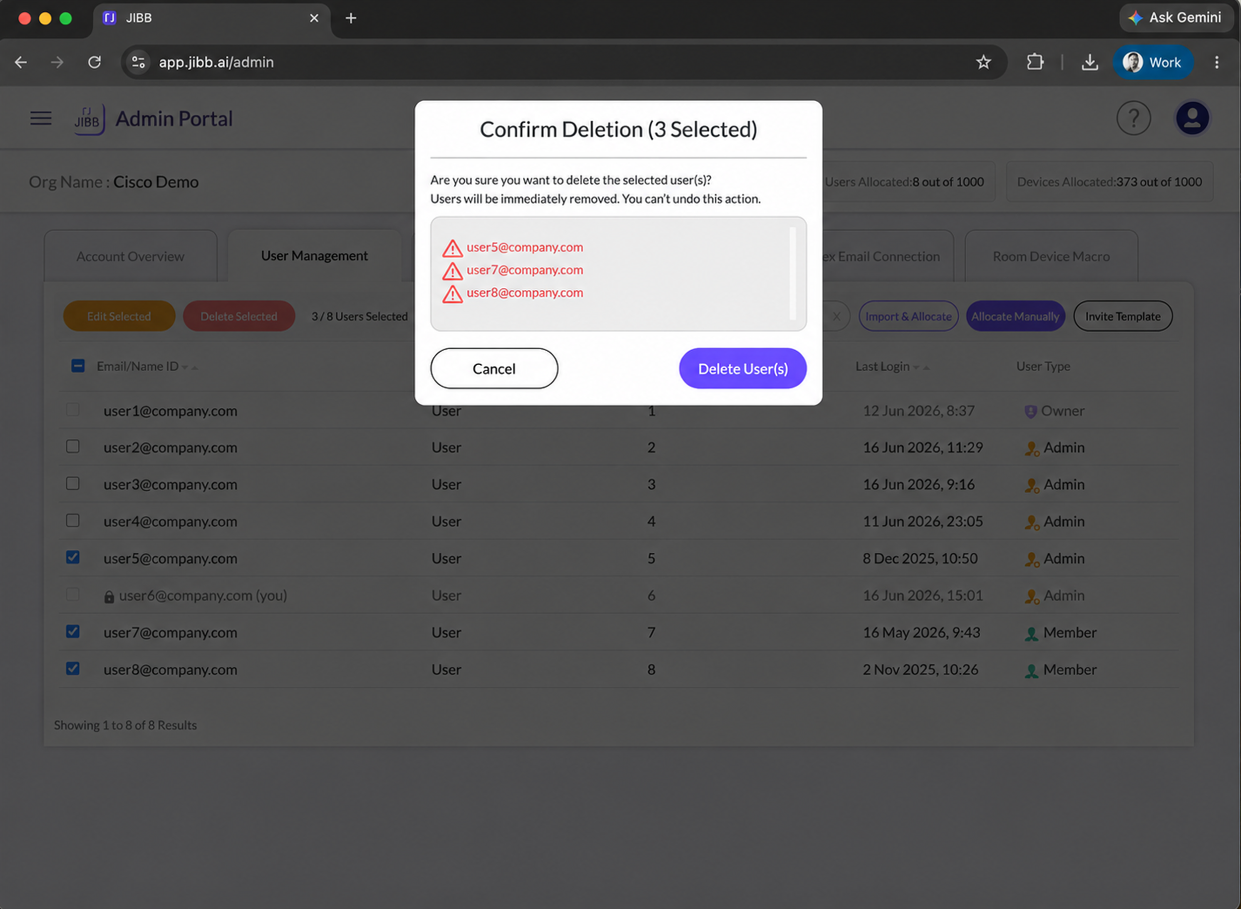 Confirm Deletion popup listing three selected user emails in red with warning icons and buttons to Cancel or Delete Users.